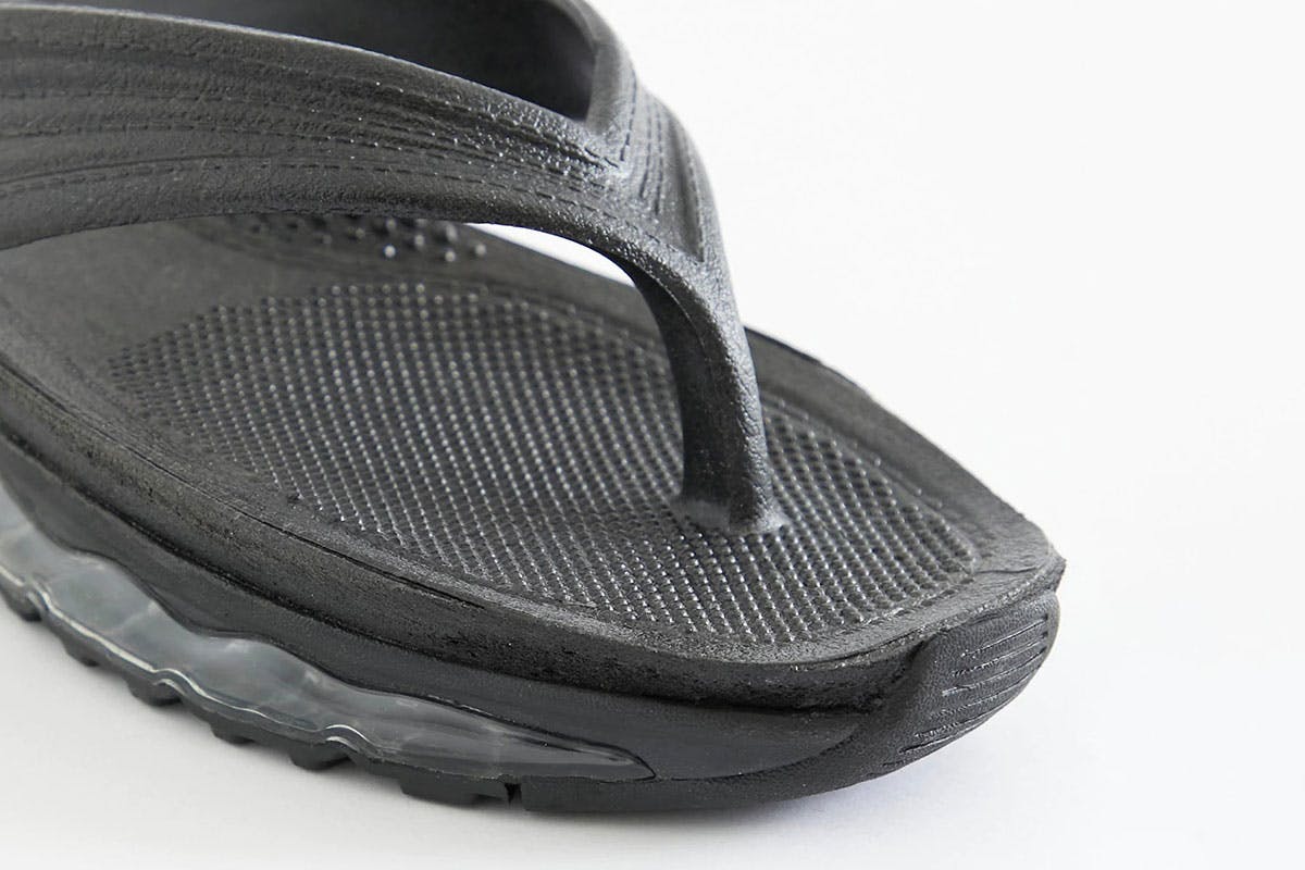 Plastic Flip-Flops With Air Soles
